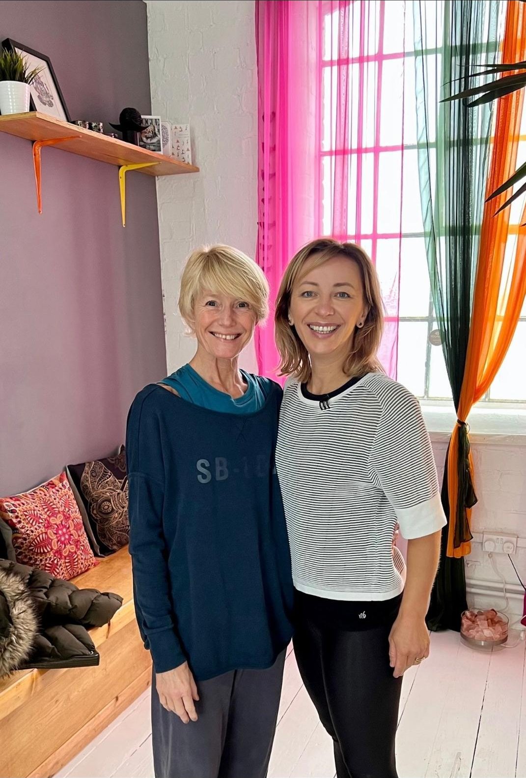 Sandra Howling and Kat Jennings smiling together in the studio